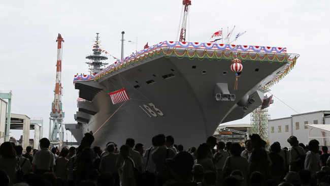 Japan Maritime Self-Defense Force's helicopter destroyer DDH183 Izumo, the largest surface combatant of the Japanese navy, is seen before its launching ceremony in Yokohama